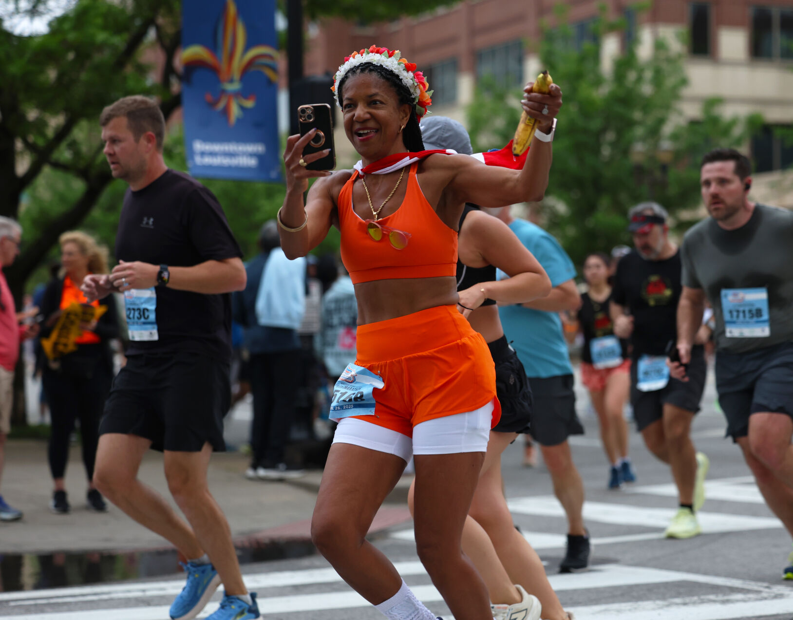 Woman takes selfie during Marathon.JPG